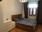 Wohnung mit Stil: 2-Zimmer-Wohnung mit Balkon & Parkett in Markkleeberg - Schlafzimmer
