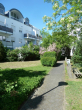 Schöne 2-Zimmer-Wohnung mit sonniger Terrasse und eigenem Gartenanteil als Kapitalanlage - Innenhof