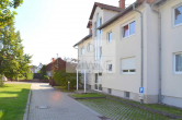 Objektansicht - Charmante Erdgeschosswohnung mit Terrasse und Gartenanteil