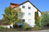 Objektansicht - Charmante Erdgeschosswohnung mit Terrasse und Gartenanteil