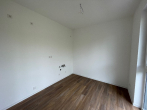 offene Küche (Referenz) - 2-Zimmer-Wohnung mit Laminat und Balkon im Neubau von 2022 in zentraler Lage