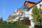 Objektansicht - Helle 2-Zimmer-Wohnung mit Terrasse und eigenem Gartenanteil