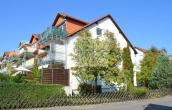 Objektansicht - Helle 2-Zimmer-Wohnung mit Terrasse und eigenem Gartenanteil