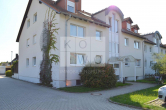 Objektansicht - Helle 2-Zimmer-Wohnung mit Terrasse und eigenem Gartenanteil