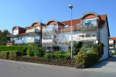 Objektansicht - Helle 2-Zimmer-Wohnung mit Terrasse und eigenem Gartenanteil