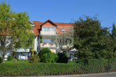 Objektansicht - Helle 2-Zimmer-Wohnung mit Terrasse und eigenem Gartenanteil