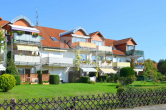 Objektansicht - Helle 2-Zimmer-Wohnung mit Terrasse und eigenem Gartenanteil