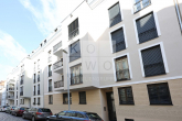 Straßenansicht - Zweitbezug im Neubau: Moderne 1 -Zimmer-Wohnung mit Parkett und Fußbodenheizung im Zentrum-Süd