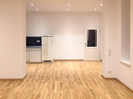 Großzügige 2-Zimmer-Wohnung mit Einbauküche in absolut zentraler Lage! - Wohnzimmer / Küche