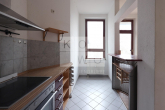 Küche mit Einbauküche - 3-Raum-Wohnung mit Laminat, Badewanne und Balkon in zentraler Lage am Zoo!